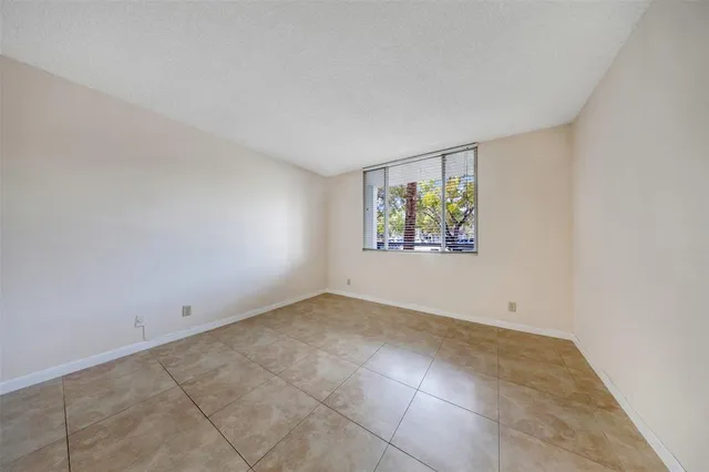 an empty room with an entryway