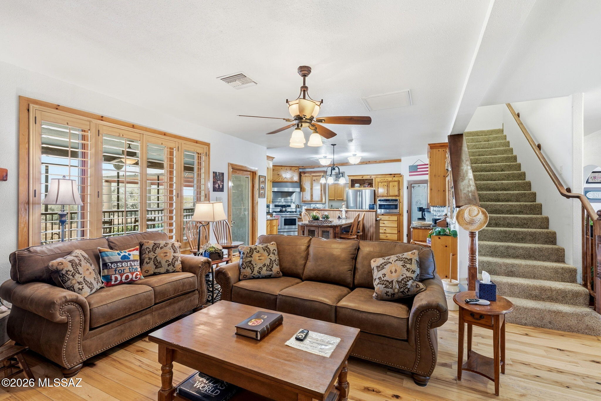 12810 West Gunsmoke Road Tucson, AZ 85736 - Photo 11 of 51 a living room with furniture and a large window