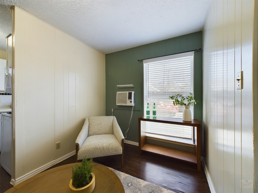 5300 Guadalupe Street, Unit 6201 Austin, TX 78751 - Photo 5 of 12 a room with furniture and a wooden floor