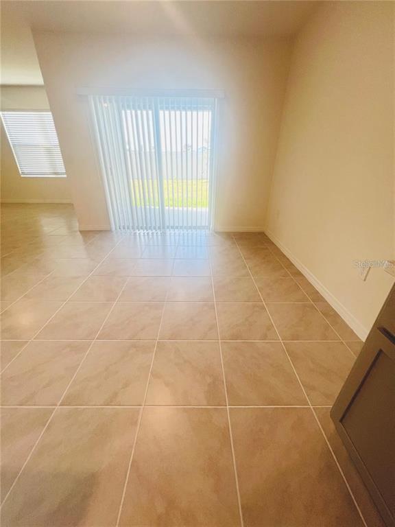 2598 Trinidad Road Haines City, FL 33844 - Photo 10 of 18 a view of an empty room with a window