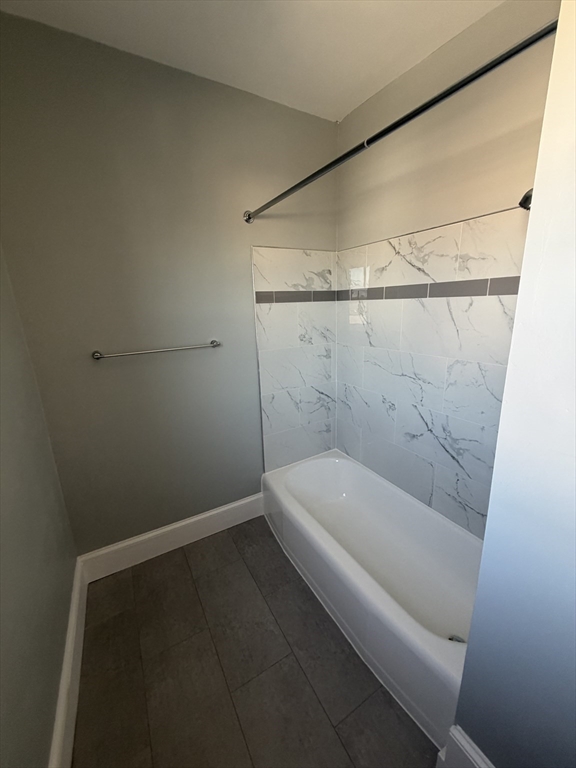 49 Federal Street, Unit 3 Beverly, MA 01915 - Photo 8 of 10 a bathroom with a bathtub