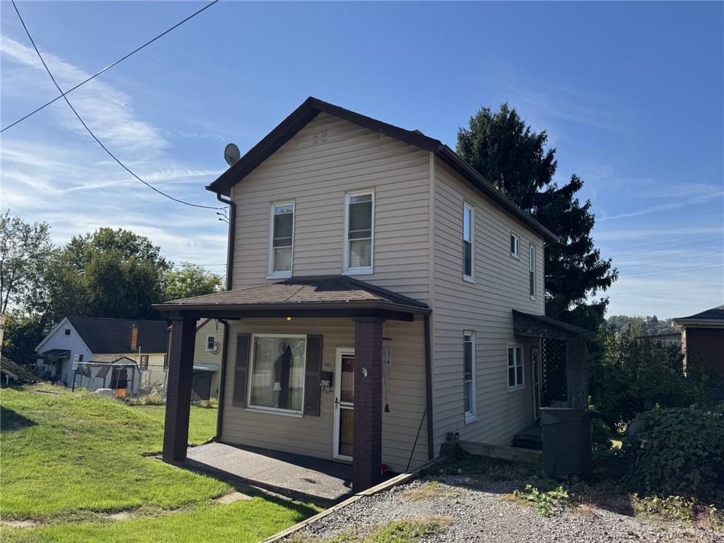 609 Lincoln Street Rochester, PA 15074 - Photo 23 of 24 a view of a small house with yard