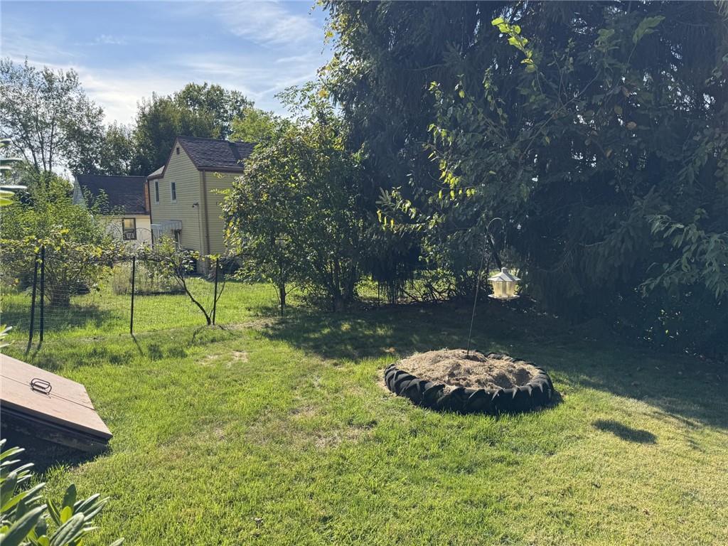 609 Lincoln Street Rochester, PA 15074 - Photo 24 of 24 a view of a backyard with a garden