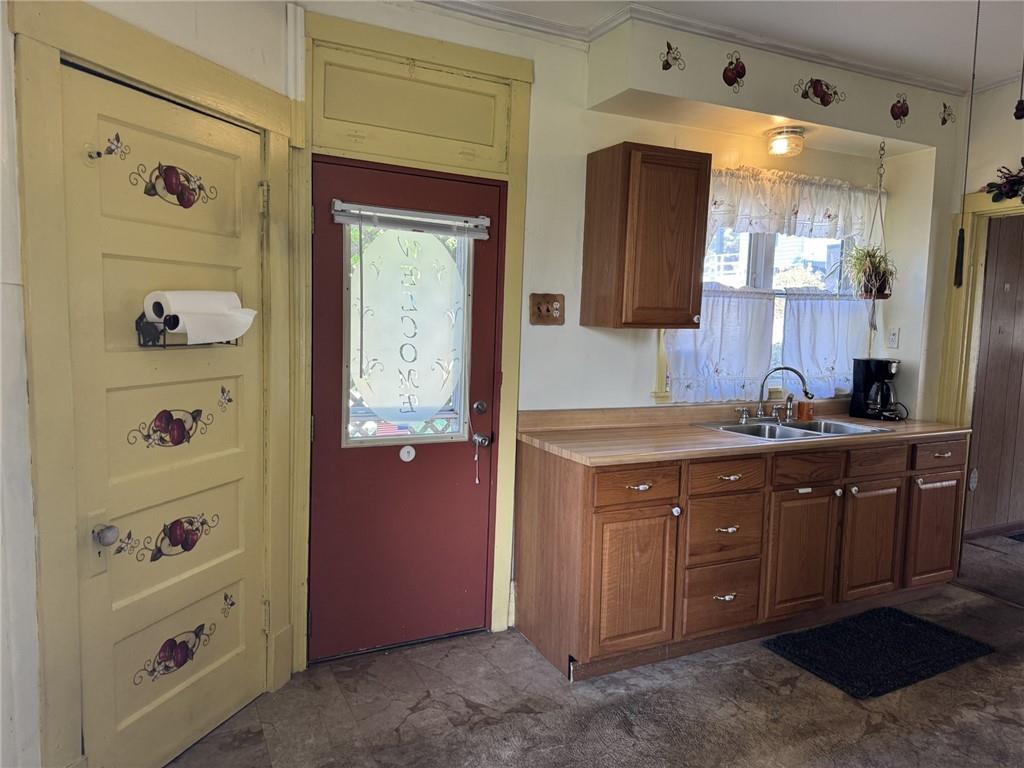 609 Lincoln Street Rochester, PA 15074 - Photo 9 of 24 a bathroom with a sink vanity and mirror