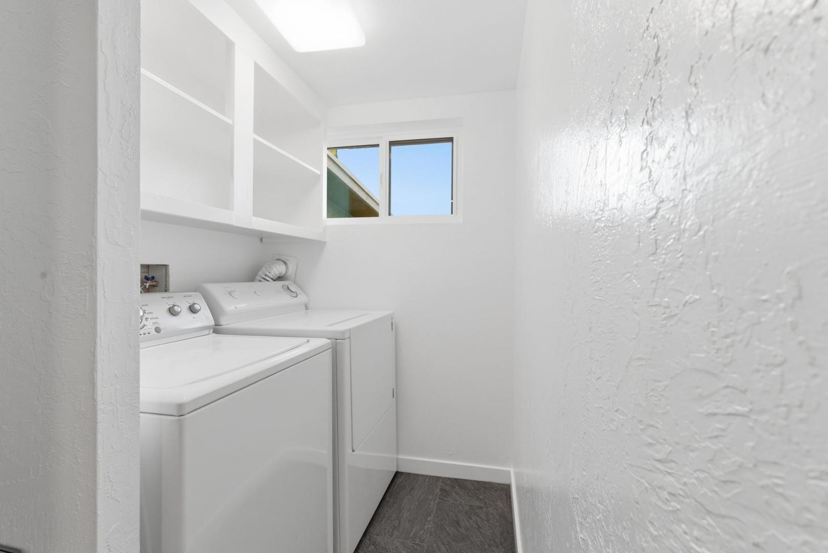 36975 North Sunset Trail Cave Creek, AZ 85331 - Photo 16 of 27 a utility room with dryer and washer