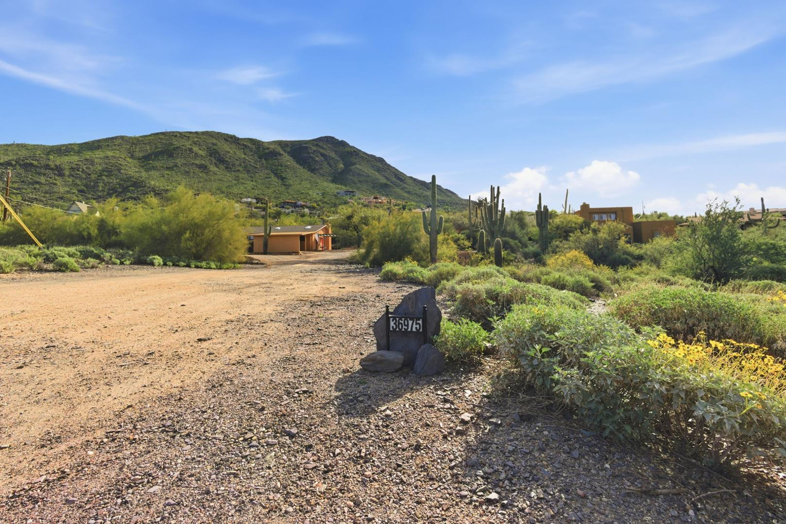 36975 North Sunset Trail Cave Creek, AZ 85331 - Photo 22 of 27 a view of a town with mountains in the background