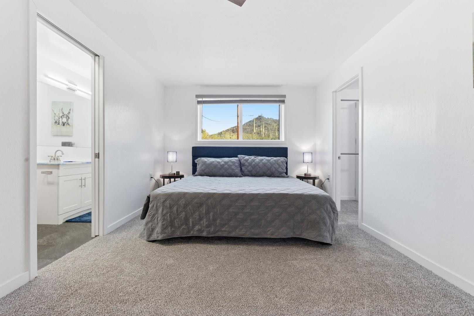 36975 North Sunset Trail Cave Creek, AZ 85331 - Photo 6 of 27 a bedroom with a bed and a painting on the wall