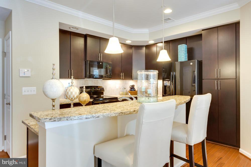 8002 Orchard Grove Road, Unit 820 Odenton, MD 21113 - Photo 3 of 30 GREAT FOR ENTERTAINING - KITCHEN