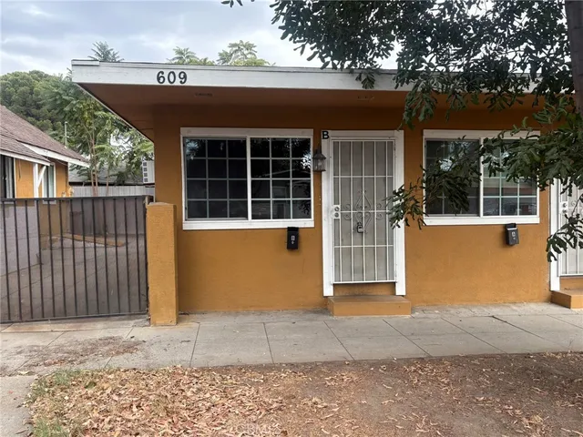 a front view of a house with a garage
