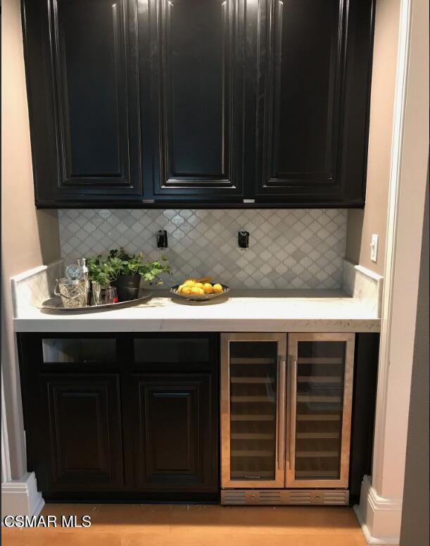3082 Eaglewood Avenue Thousand Oaks, CA 91362 - Photo 12 of 29 a kitchen with stainless steel appliances granite countertop wooden cabinets a stove and a sink