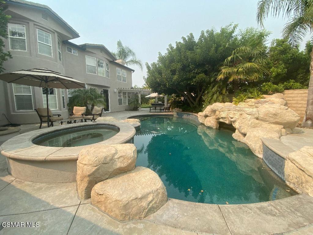 3082 Eaglewood Avenue Thousand Oaks, CA 91362 - Photo 27 of 29 a swimming pool with outdoor seating and yard