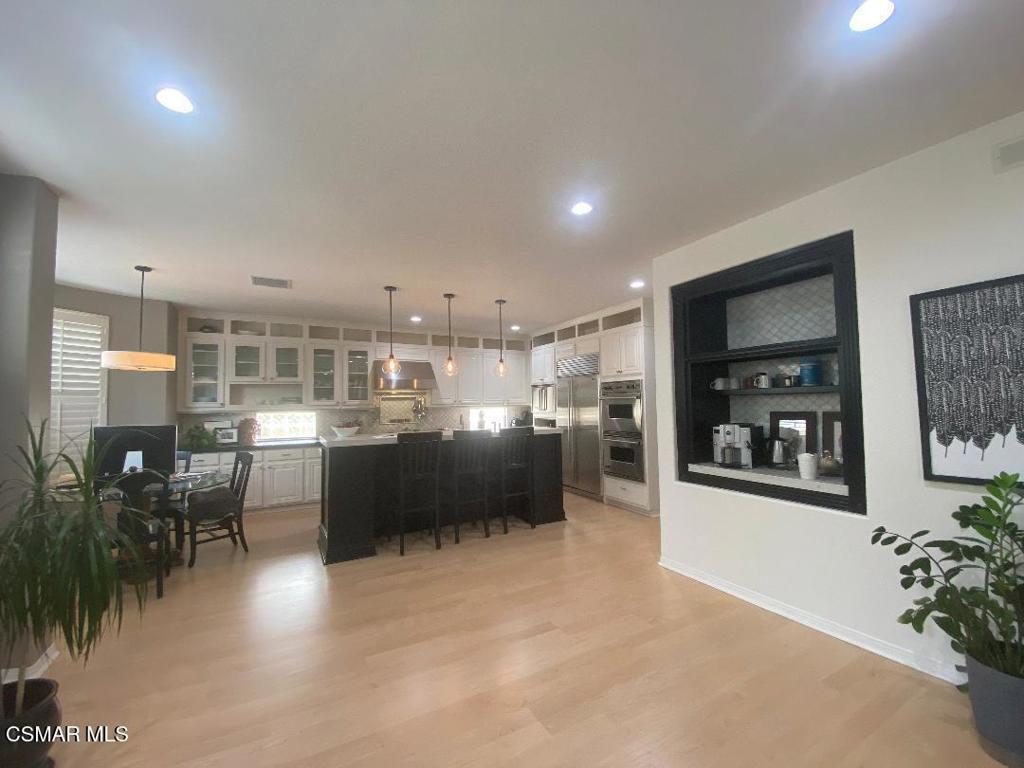 3082 Eaglewood Avenue Thousand Oaks, CA 91362 - Photo 9 of 29 a living room with furniture and a flat screen tv