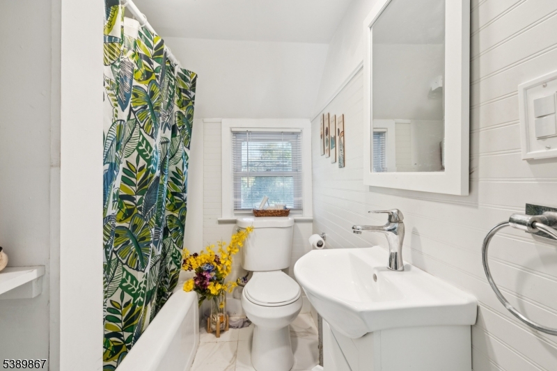 385 Ridge Road Dayton, NJ 08810 - Photo 13 of 14 a bathroom with a sink mirror vanity and toilet