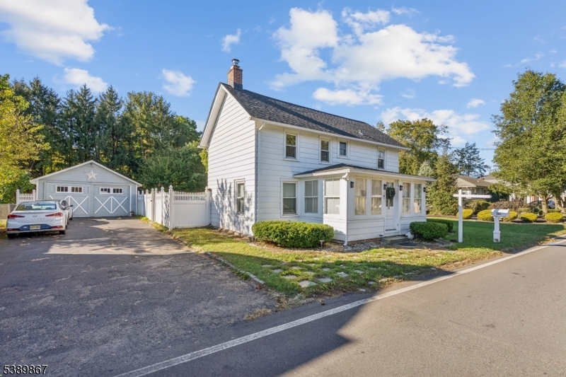 385 Ridge Road Dayton, NJ 08810 - Photo 2 of 14 a view of house with a yard