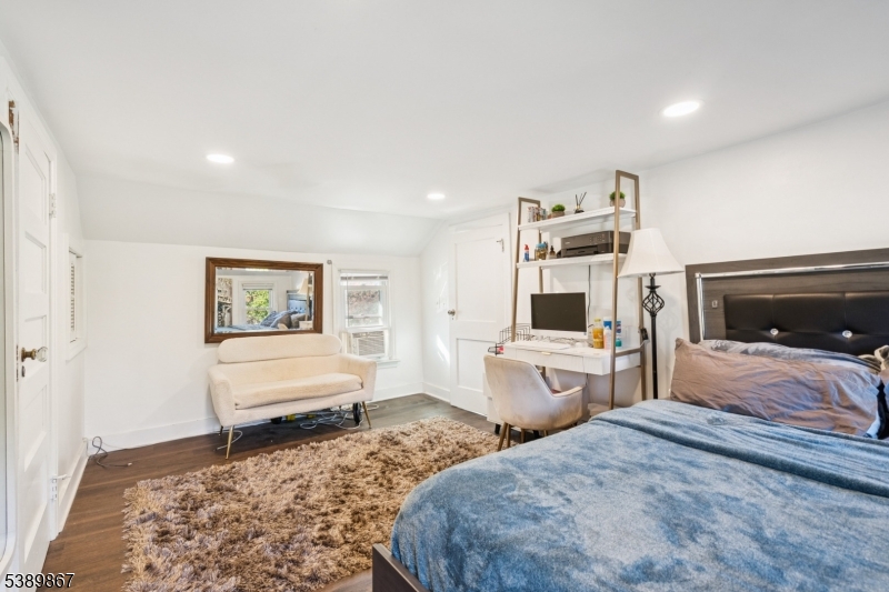 385 Ridge Road Dayton, NJ 08810 - Photo 10 of 14 a bedroom with a bed and a television