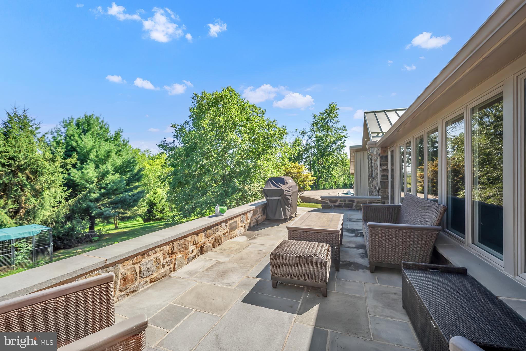 1851 Meetinghouse Road Warminster, PA 18974 - Photo 18 of 66 a view of a patio with couches and potted plants