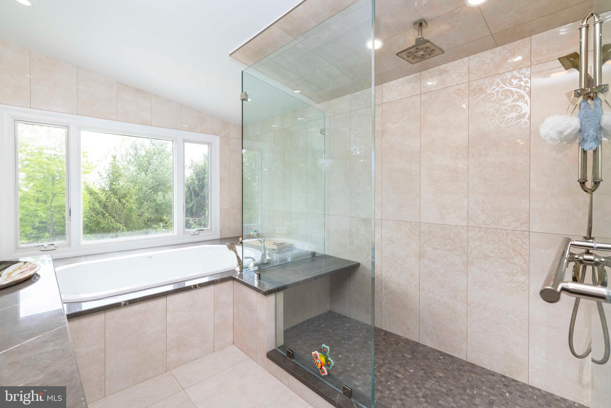 1851 Meetinghouse Road Warminster, PA 18974 - Photo 32 of 66 a bathroom with a tub sink and window