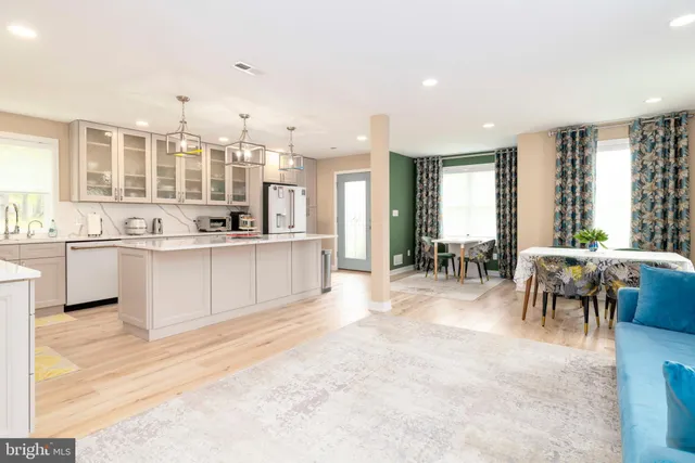 a view of a garage with a bike and white car