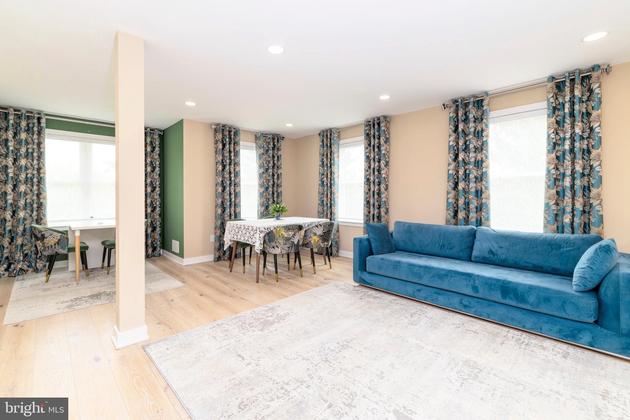 1851 Meetinghouse Road Warminster, PA 18974 - Photo 34 of 66 a living room with furniture and a large window
