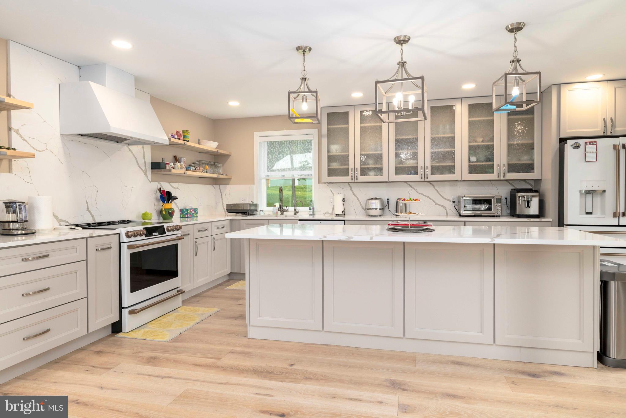1851 Meetinghouse Road Warminster, PA 18974 - Photo 35 of 66 a kitchen with a stove a sink and a refrigerator
