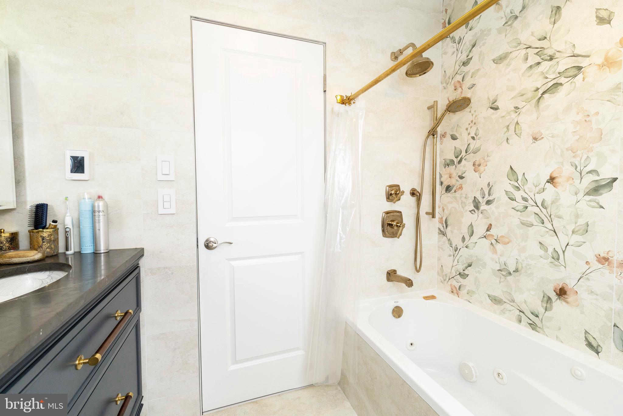 1851 Meetinghouse Road Warminster, PA 18974 - Photo 40 of 66 a bathroom with a bathtub and a shower