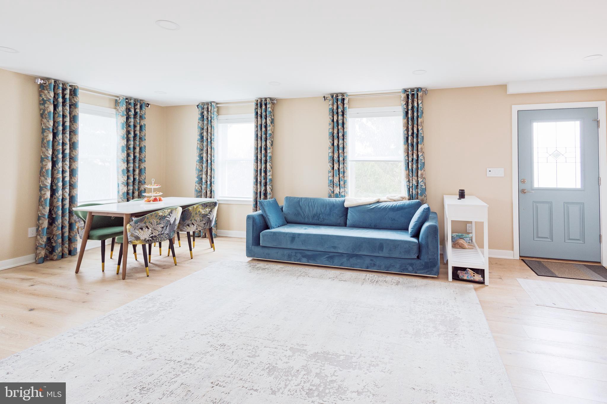 1851 Meetinghouse Road Warminster, PA 18974 - Photo 43 of 66 a living room with furniture and large windows