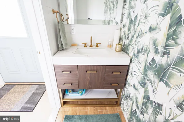 a view of livingroom with furniture and wooden floor