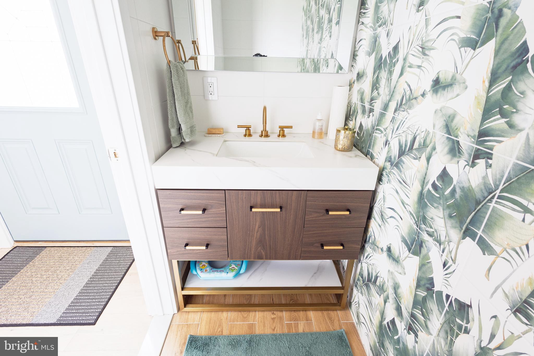 1851 Meetinghouse Road Warminster, PA 18974 - Photo 44 of 66 a bathroom with a granite countertop sink and a mirror