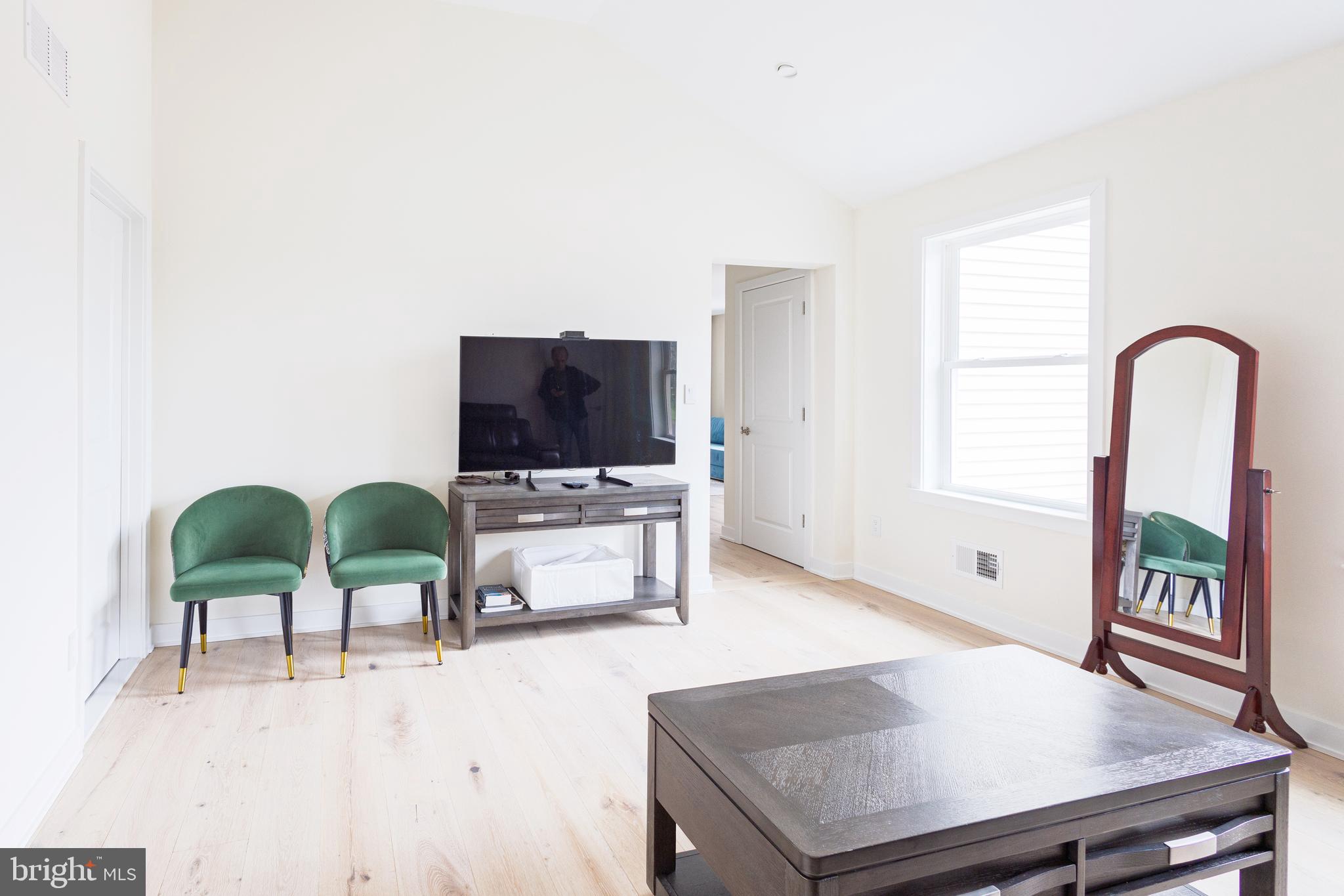 1851 Meetinghouse Road Warminster, PA 18974 - Photo 46 of 66 a living room with furniture and flat screen tv