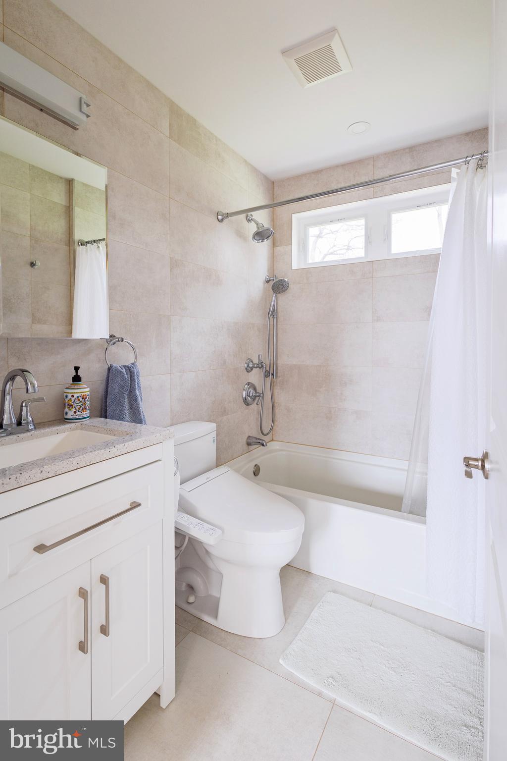 1851 Meetinghouse Road Warminster, PA 18974 - Photo 47 of 66 a bathroom with a sink a toilet and shower