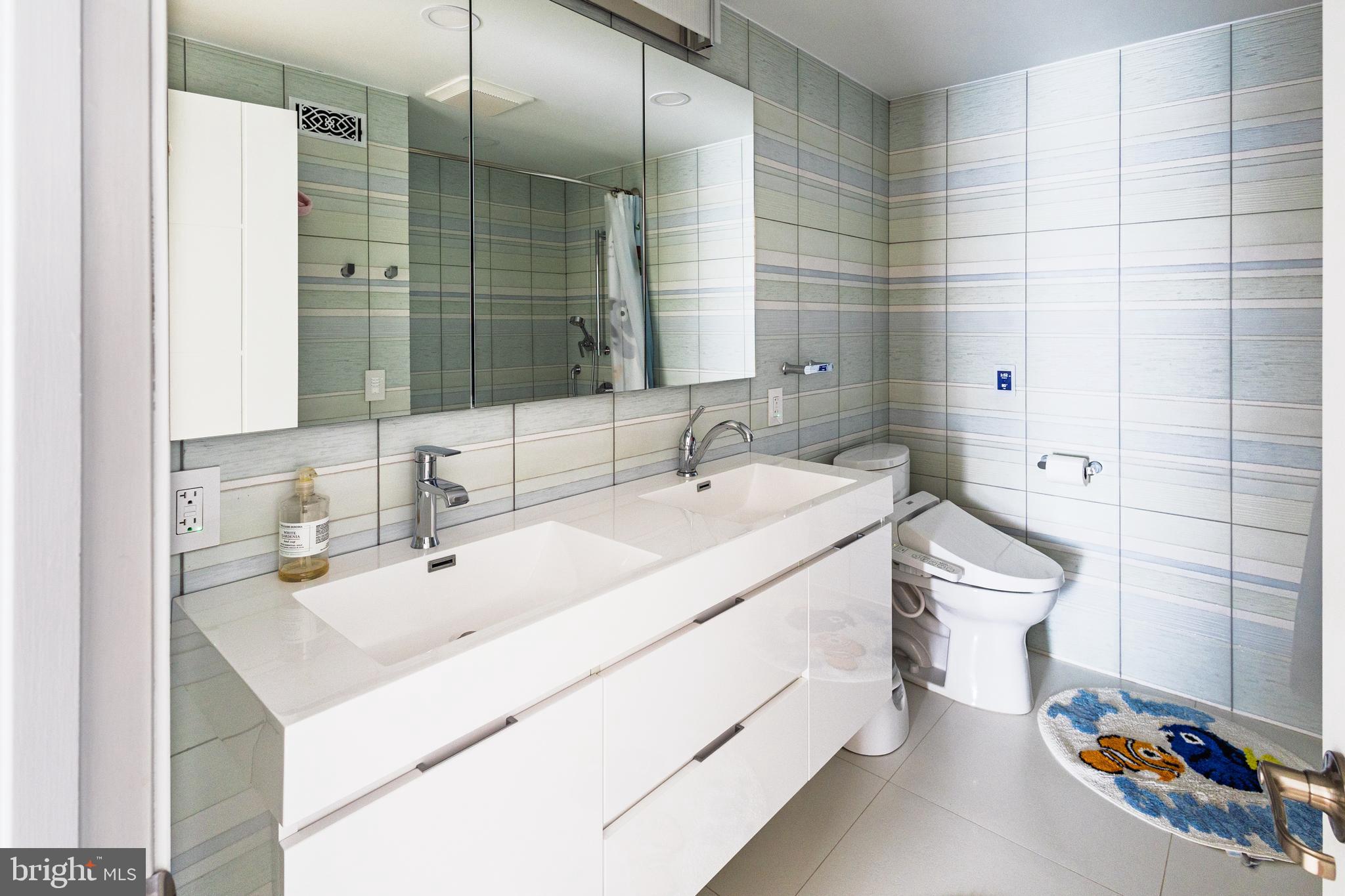 1851 Meetinghouse Road Warminster, PA 18974 - Photo 52 of 66 a bathroom with a sink a toilet and shower