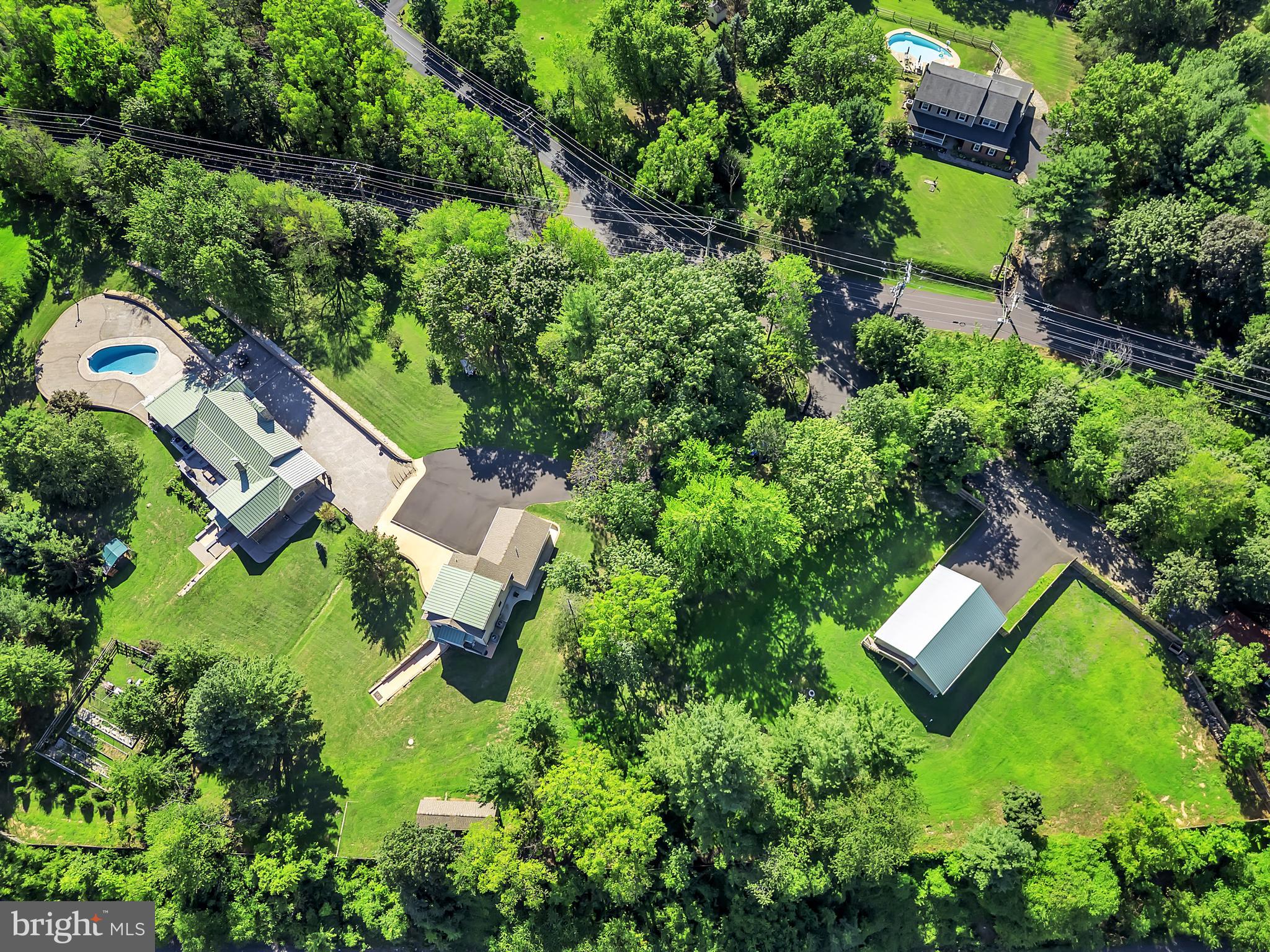 1851 Meetinghouse Road Warminster, PA 18974 - Photo 6 of 66 an aerial view of a house with swimming pool outdoor seating and yard