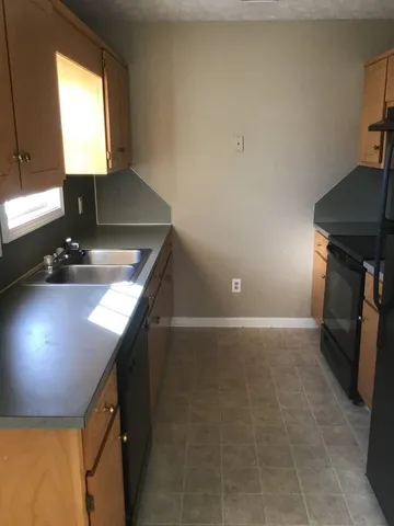 a view of kitchen and window