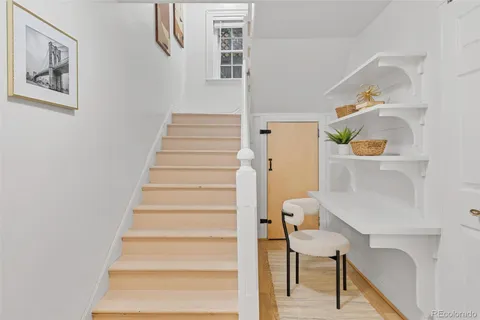 a view of entryway and workspace