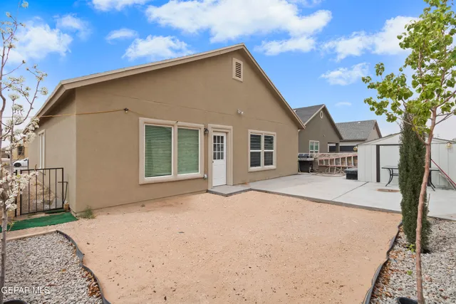 a house with trees in front of it