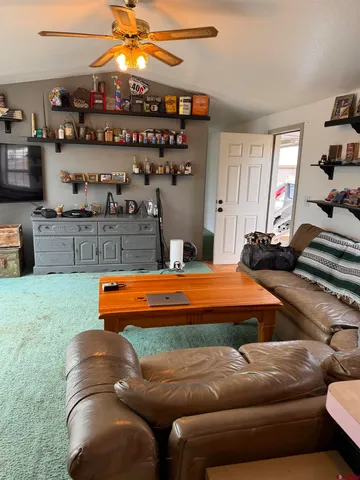 a bedroom with furniture and window