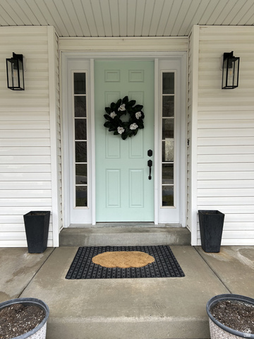 387 North Loafer Canyon Road Payson, UT 84651 - Photo 2 of 94 Light mint entry door with sidelights, featuring white trim and black hardware