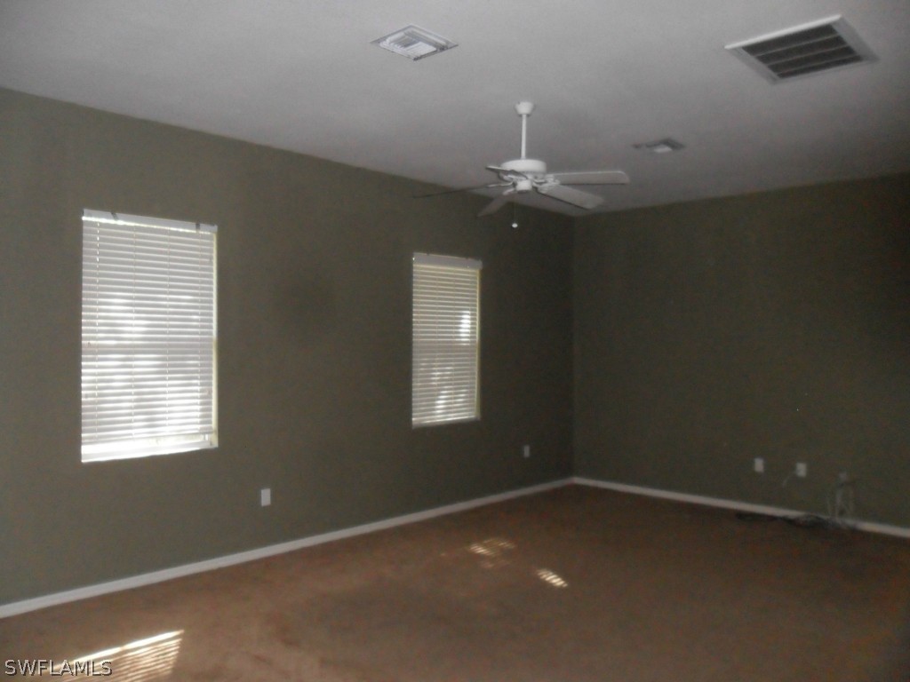18000 Persimmon Ridge Road Alva, FL 33920 - Photo 24 of 25 an empty room with a window