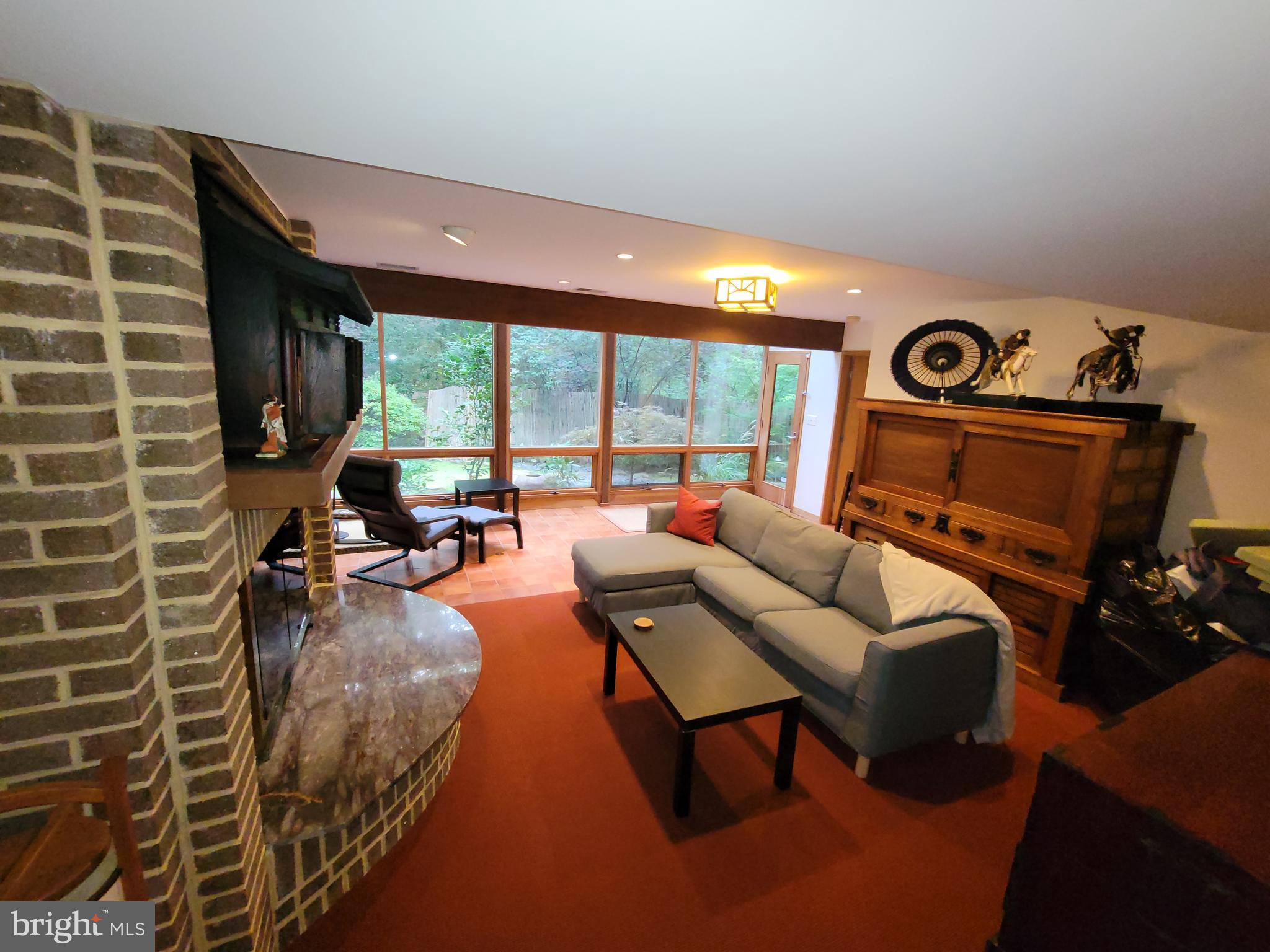 686 Discovery Road Davidsonville, MD 21035 - Photo 34 of 74 Lower level 2 family room w/FP & lots of windows