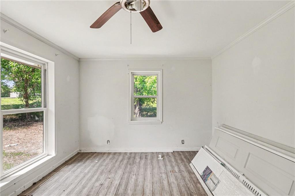 123 Baker Circle Southeast Calhoun, GA 30701 - Photo 6 of 15 a view of room with window and wooden floor