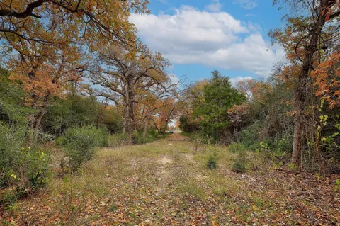 a view of lake with green space