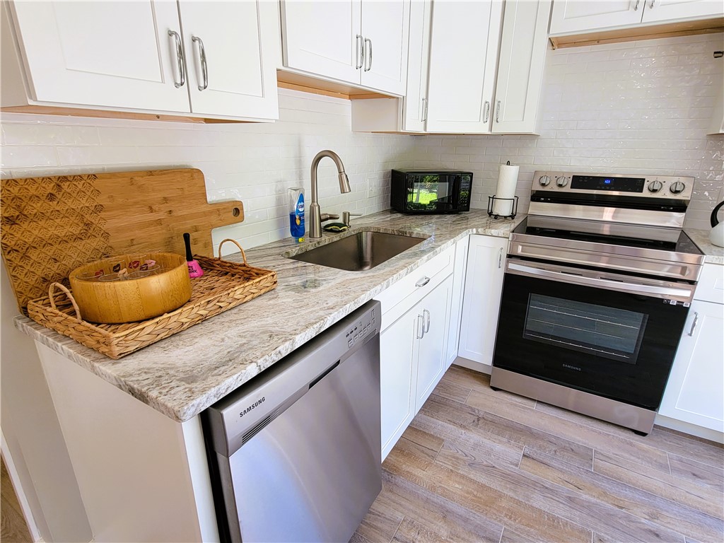 129 Connection Street Newport, RI 02840 - Photo 2 of 23 High end appliances and counters make this kitchen a breeze to cook in