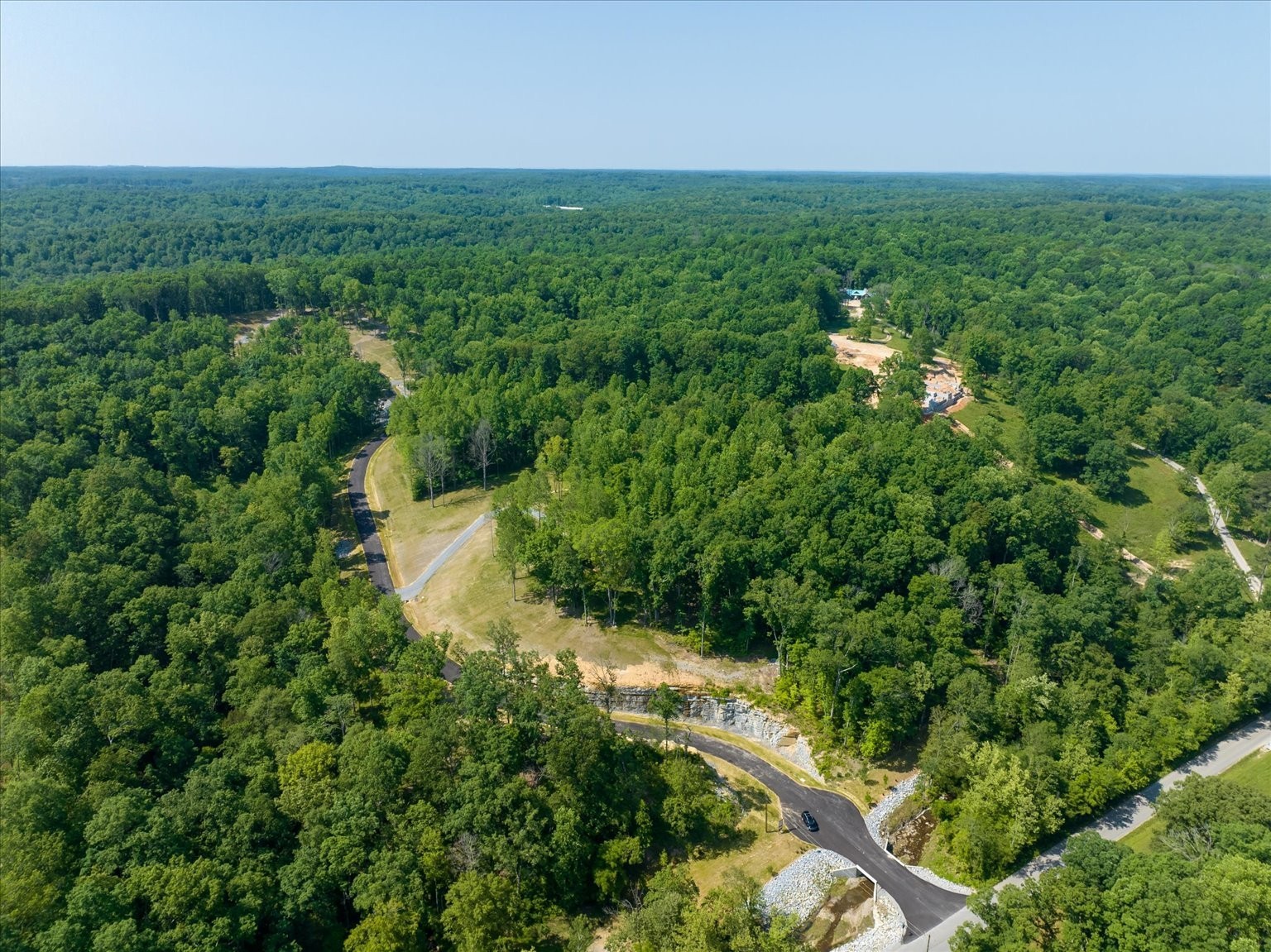 a view of a yard with an outdoor space