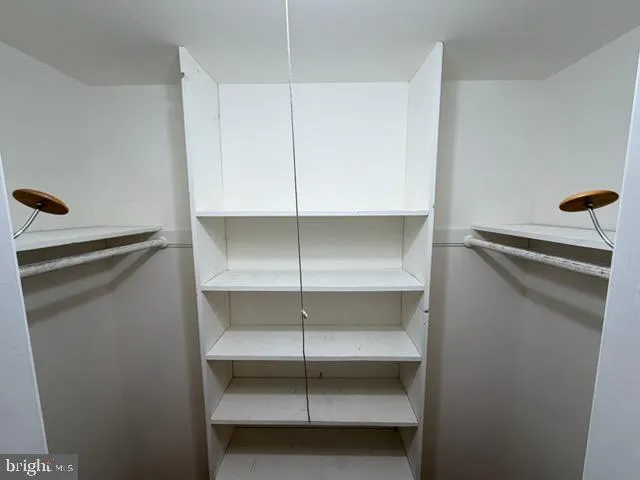 a view of an empty walk in closet