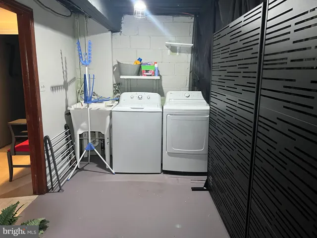 a backyard of a house with outdoor seating and green space