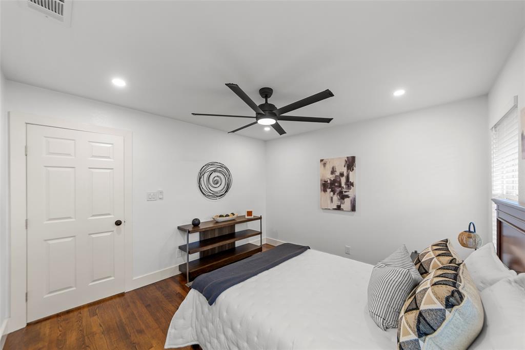 2945 Healey Drive Dallas, TX 75228 - Photo 21 of 38 a bedroom with a bed and a window