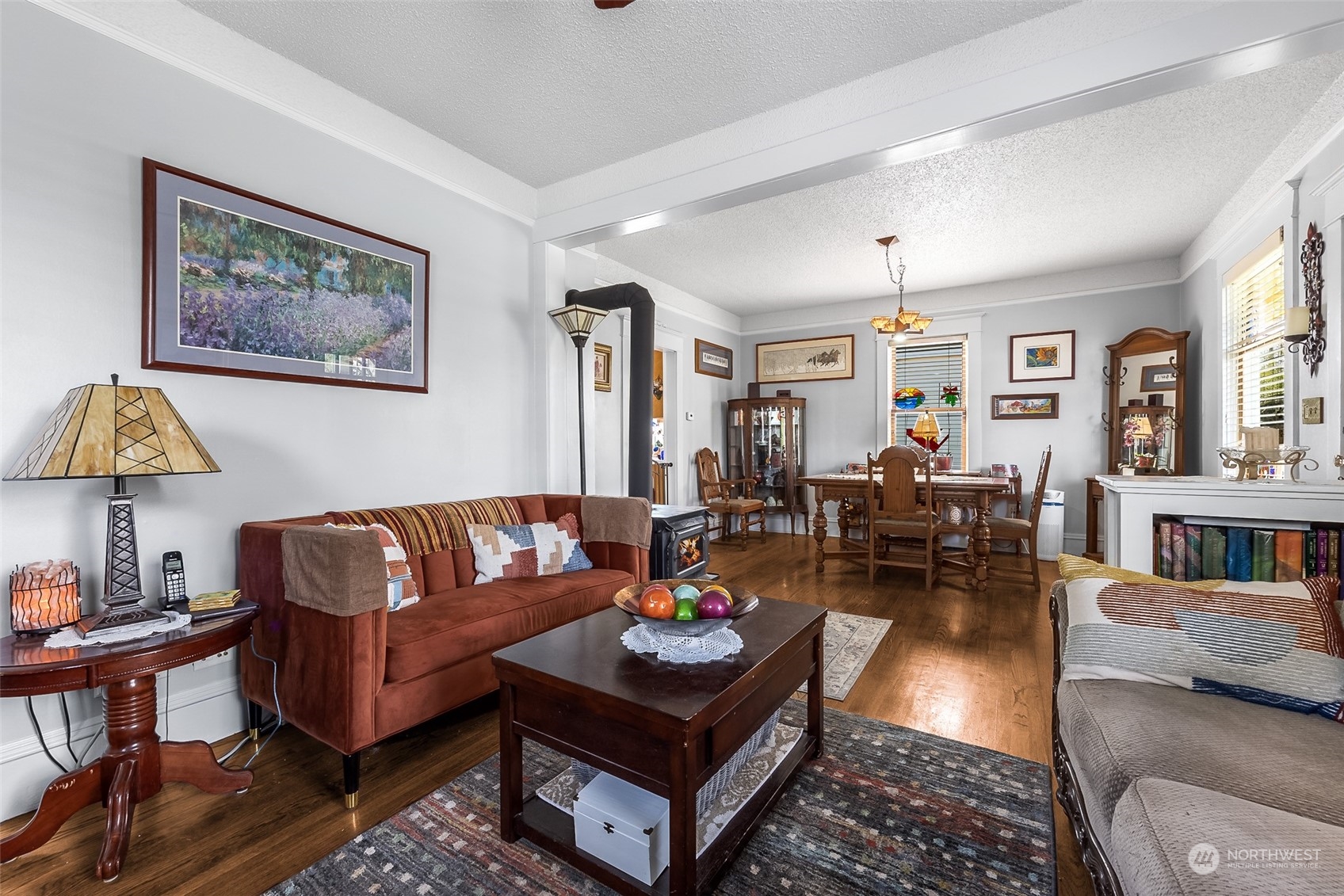222 Wells Avenue North Renton, WA 98057 - Photo 16 of 23 a living room with furniture a rug and a window