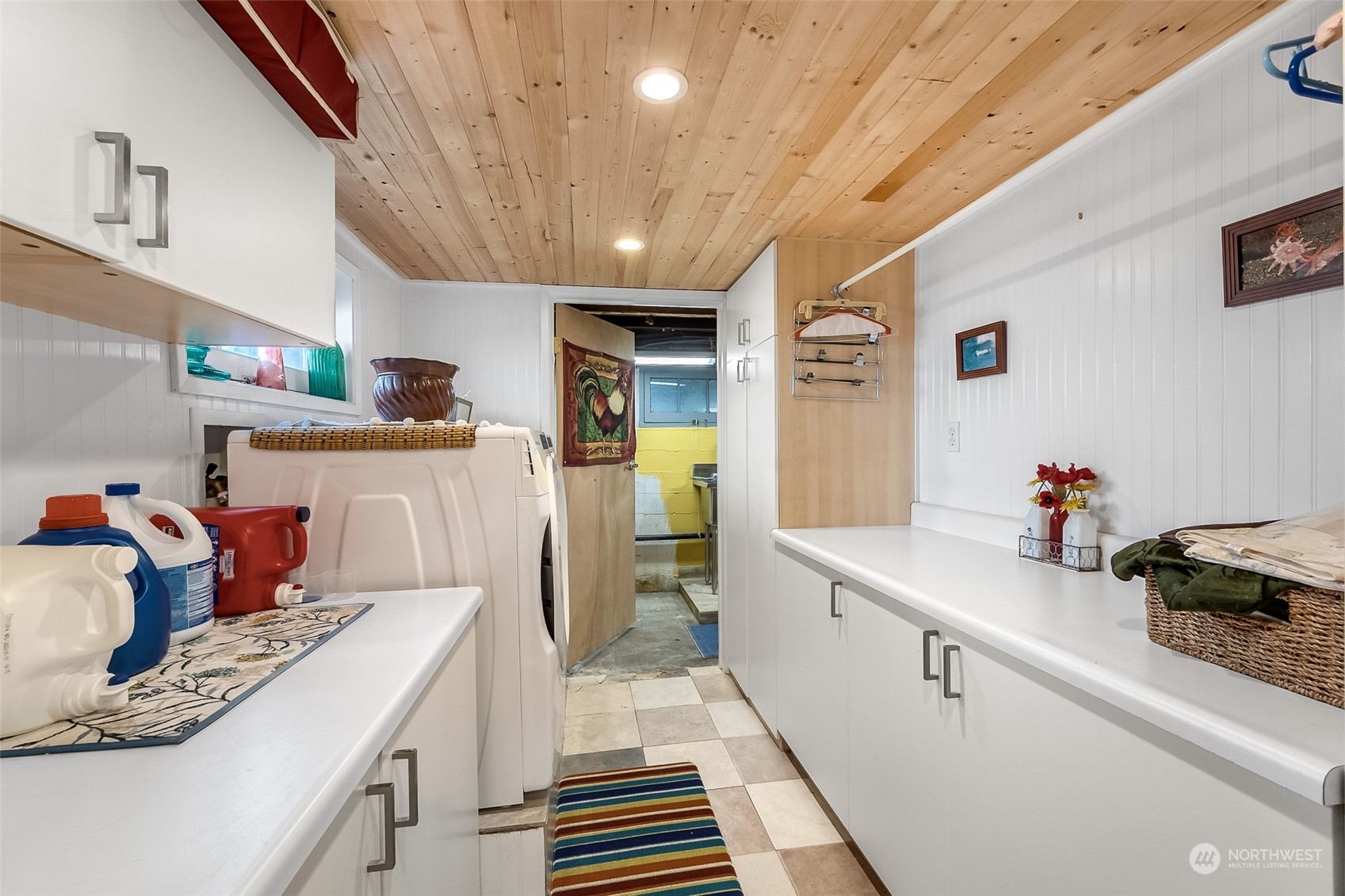 222 Wells Avenue North Renton, WA 98057 - Photo 20 of 23 a kitchen with a sink appliances and cabinets
