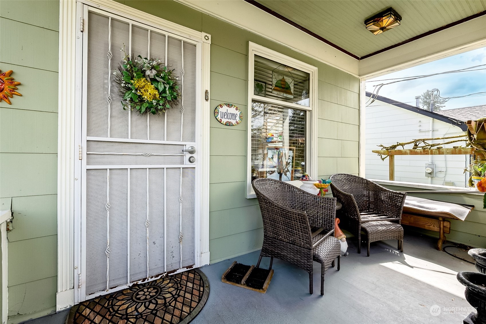 222 Wells Avenue North Renton, WA 98057 - Photo 3 of 23 a balcony with furniture and window