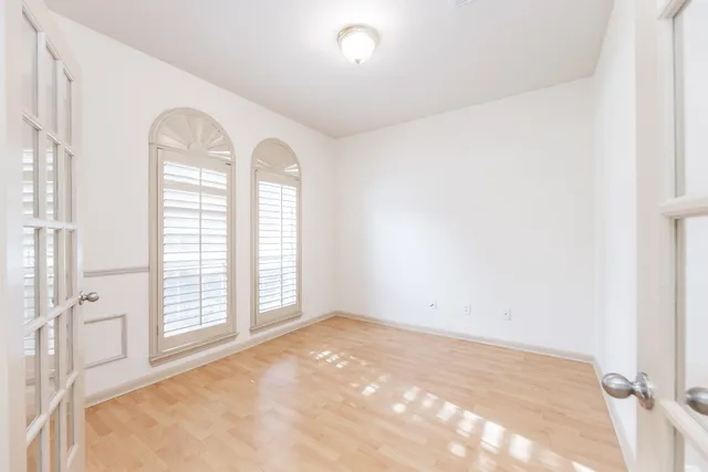 an empty room with windows